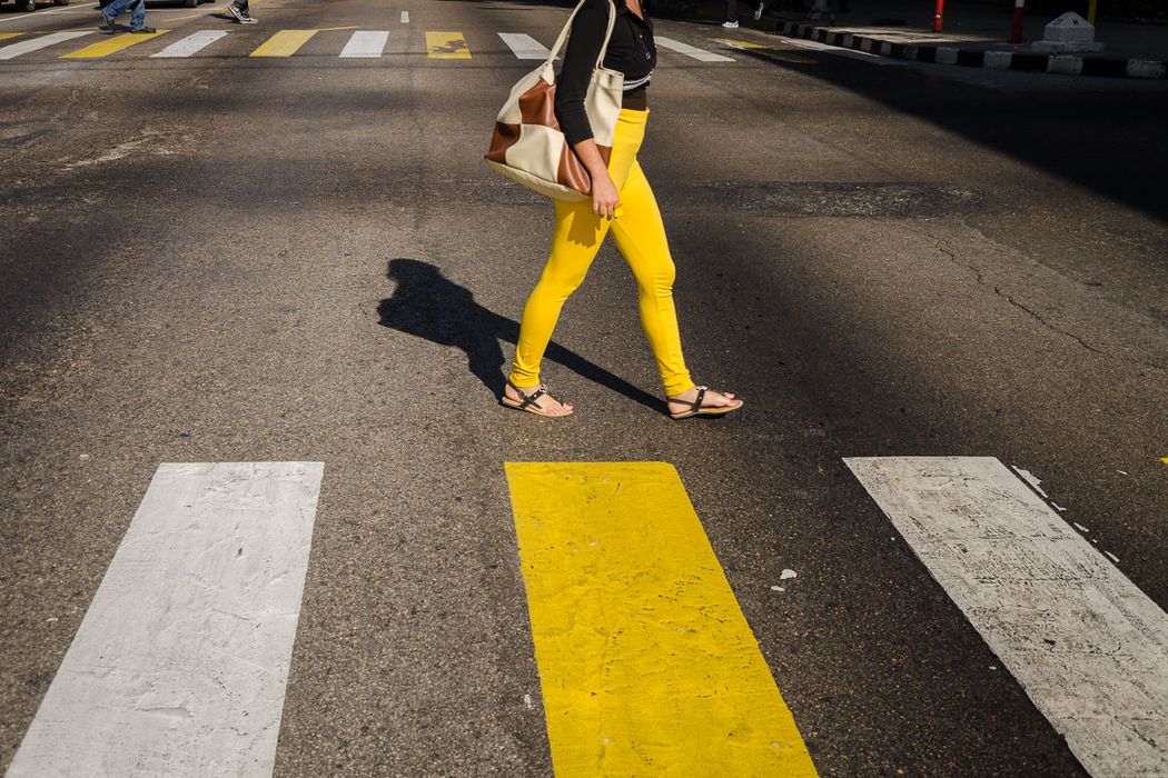 legs of a cuban woman crossing a pedestrian 