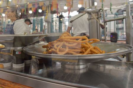 churros the traditional food in fallas festivity in valencia, spain