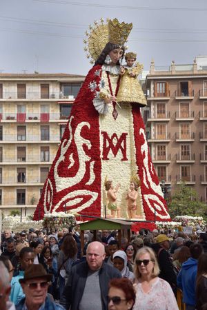 virgen de los desamparados in valencia with her giant dress of flowers by louis alarcon