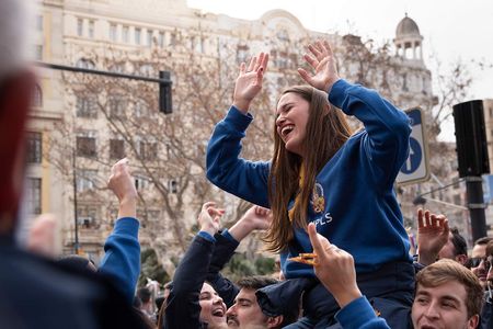 valencian woman smiling in fallas festivity by louis alarcon