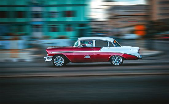 Classic American cars in Havana, Cuba, adding a touch of nostalgia to the city's urban landscape