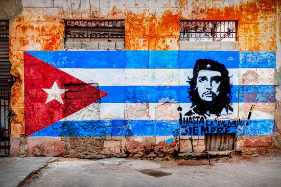Cuban flags waving in the breeze in Havana, Cuba, symbolizing the country's pride and patriotism CHE GUEVARA