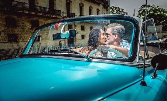 Professional photographer capturing vacation memories in Havana, Cuba
