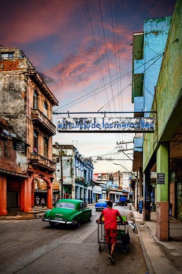 Picturesque streets of Havana, Cuba, lined with colorful buildings and lively people