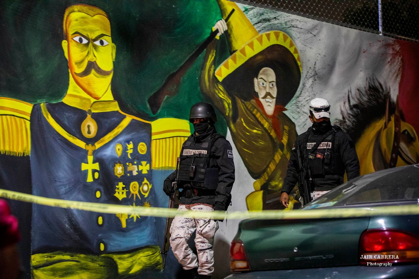 Elementos de la Guardia Nacional resguardan una zona donde dos personas fueron asesinadas en calles de la colonia Defensores de la República, alcaldía Gustavo A. Madero, Ciudad de México.Enero 2022