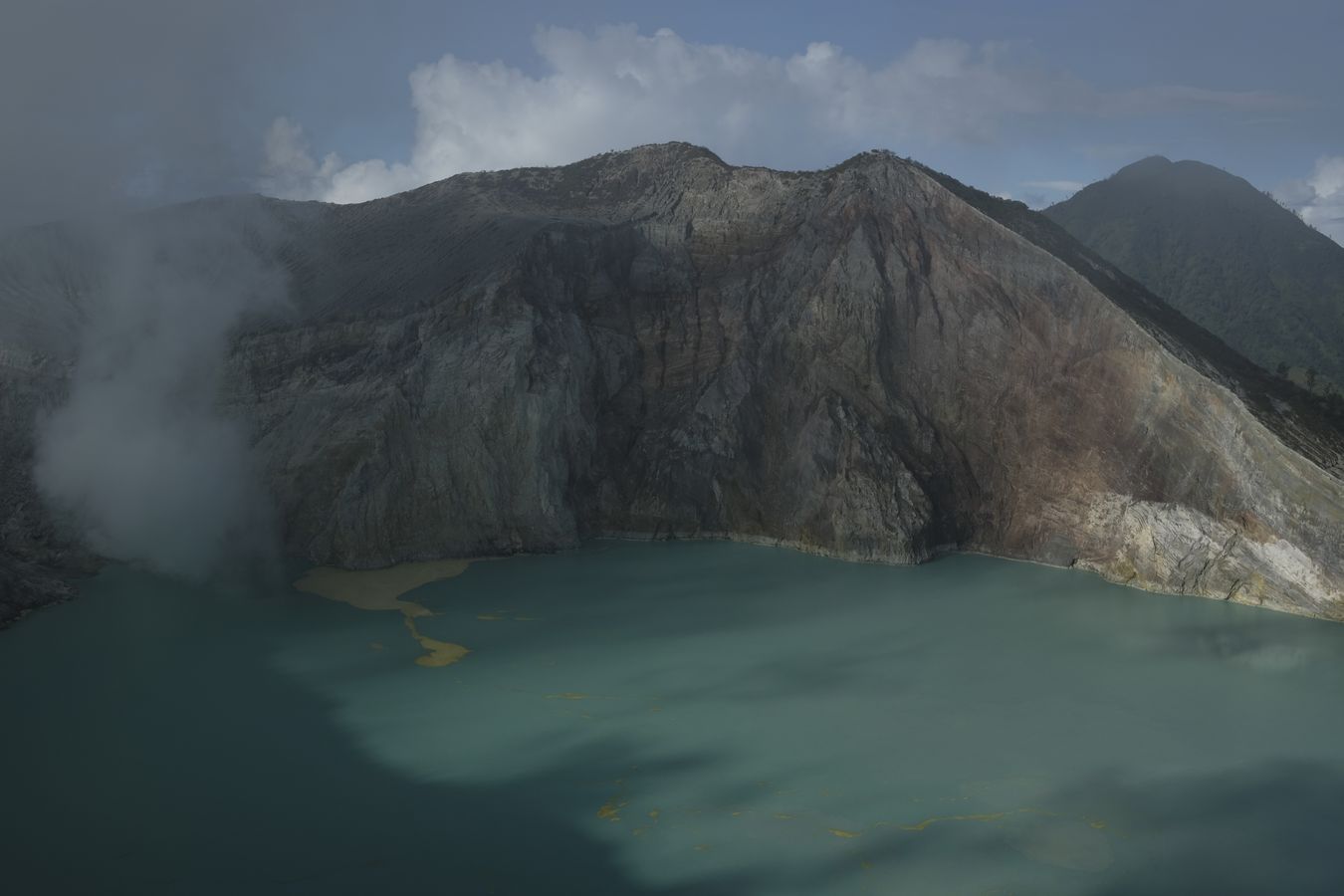 View of the lake in the crater of the Ijen volcano