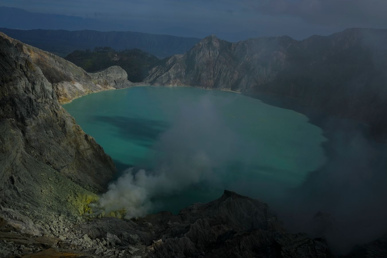 Views of the lake in the crater of the Ijen volcano