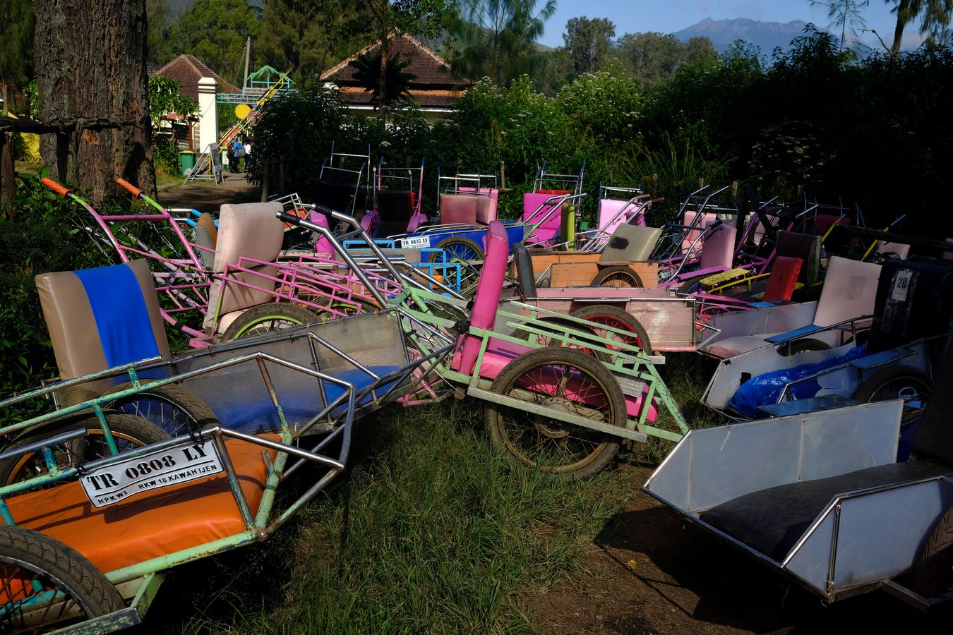 Wheelbarrows for transporting tourist parked at the start of the climbs th the Ijen volcano