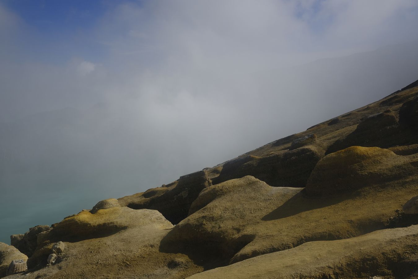 Solidified lava landscape around the crater of the Ijen volcano