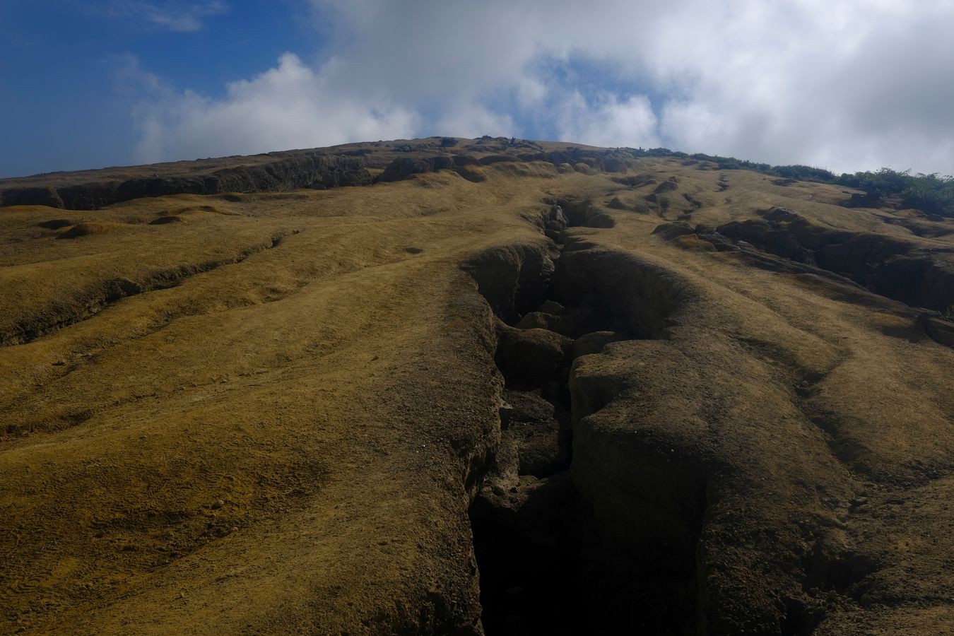 Solidified lava landscape around the crater of the Ijen volcano