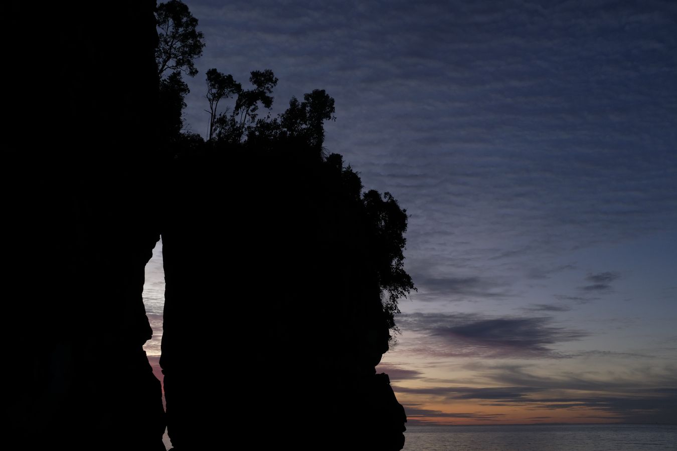 Cliff Vegetation and Sunset Landscape 