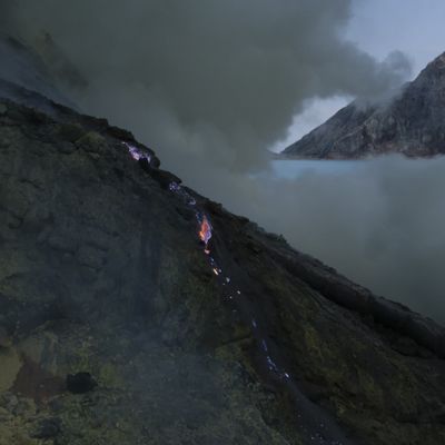 Dawn breaks over the caldera of the Ijen volcano