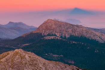 The Tomir mountain under the casting shadow of puig de Massanella, Tramuntana mountains, Majorca