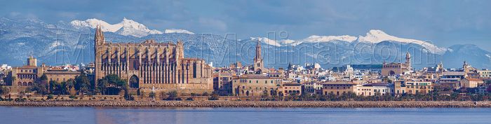 Palma de Majorca's seafront. The cathedral and Tramuntana mountains in winter, Majorca