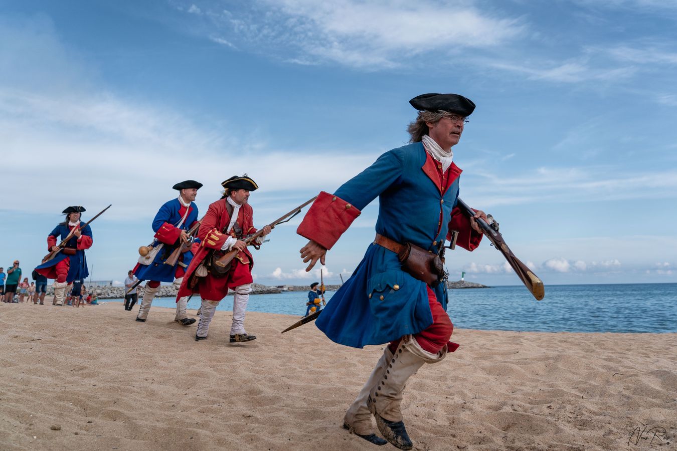 the troop runs through the sand