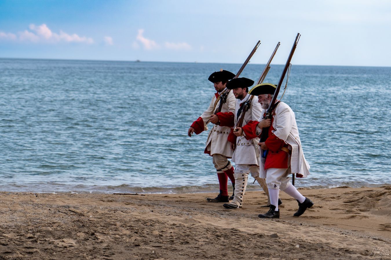 three soldiers walk overlapping