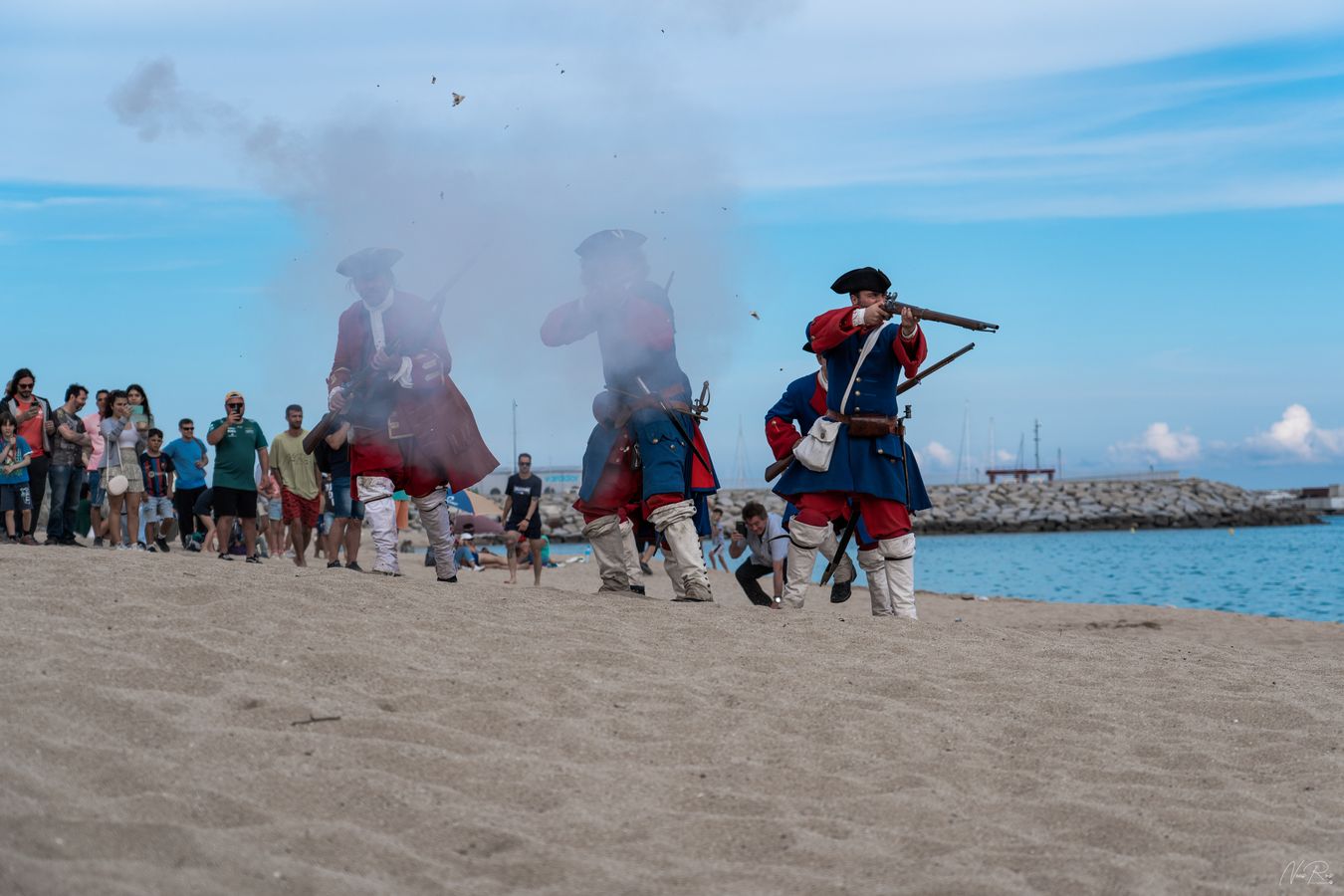 shots, gunpowder and expectation of the attendees