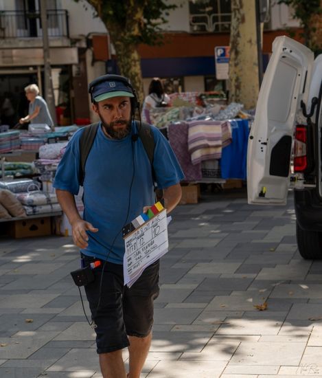 Camera assistant with clapperboard