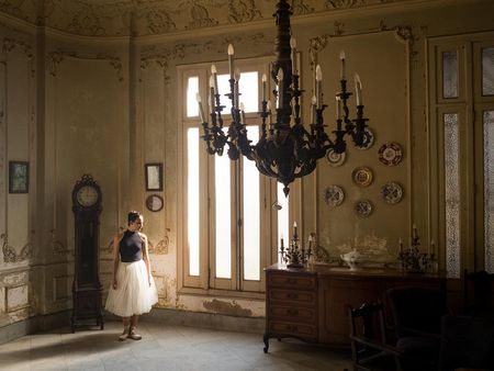 colonial lamp and ballet dancer in havana, cuban photography about old luxury