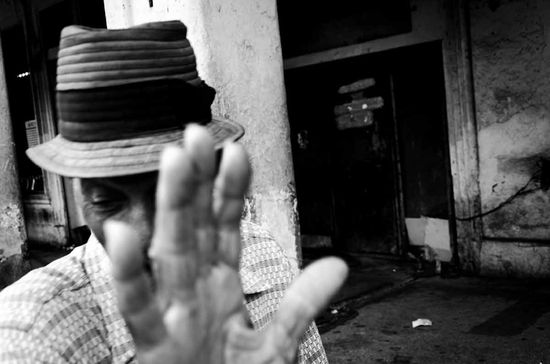 man hidding his face, cuban photography fine art by louis alarcon