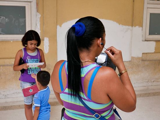 a cuban family connected to internet in havana, a photo essay by louis alarcon