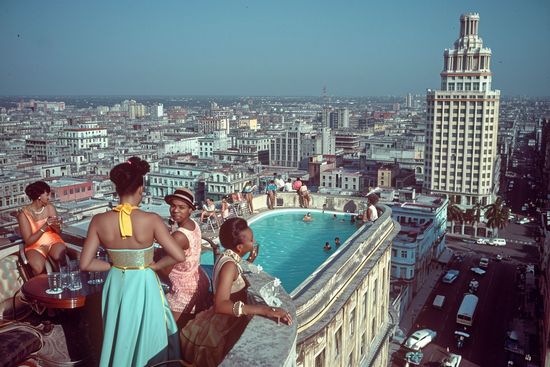 group of cubans in a terrace in havana generated with AI