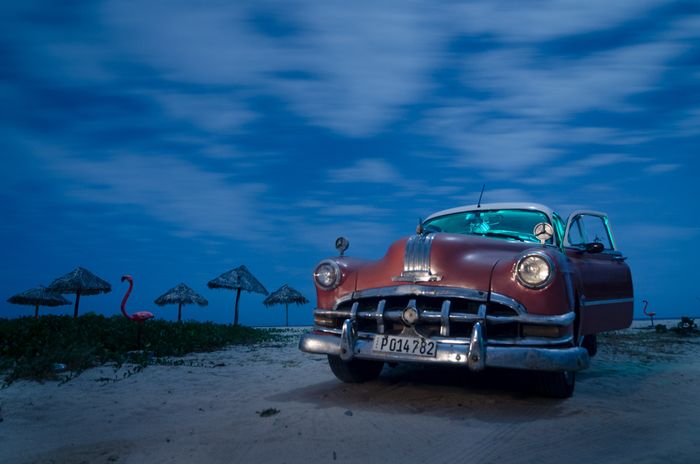 Old car in a beach of Cuba by master louis alarcon