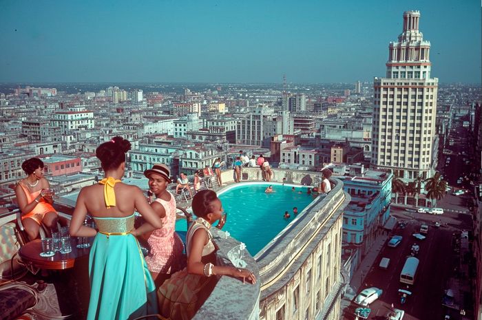 Group of girls in a swimming pool in a 1950s Havana skyscraper, AI image documentary project by Louis Alarcon