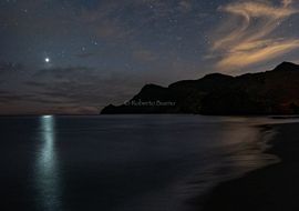 Venus and his reflection with shooting star. Cabo de Gata