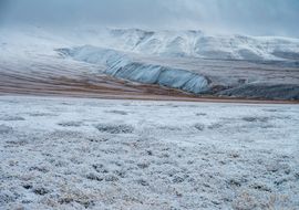 Snowy tundra and Richardson Mountains. Dempster Highway. NWT