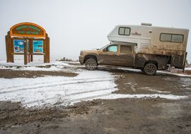 Mud and snow at Arctic Circle. Dempster Highway. Yukon