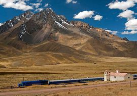 Train, church and Andean Mountains. Abra la Raya 4335 m.o.s.l.